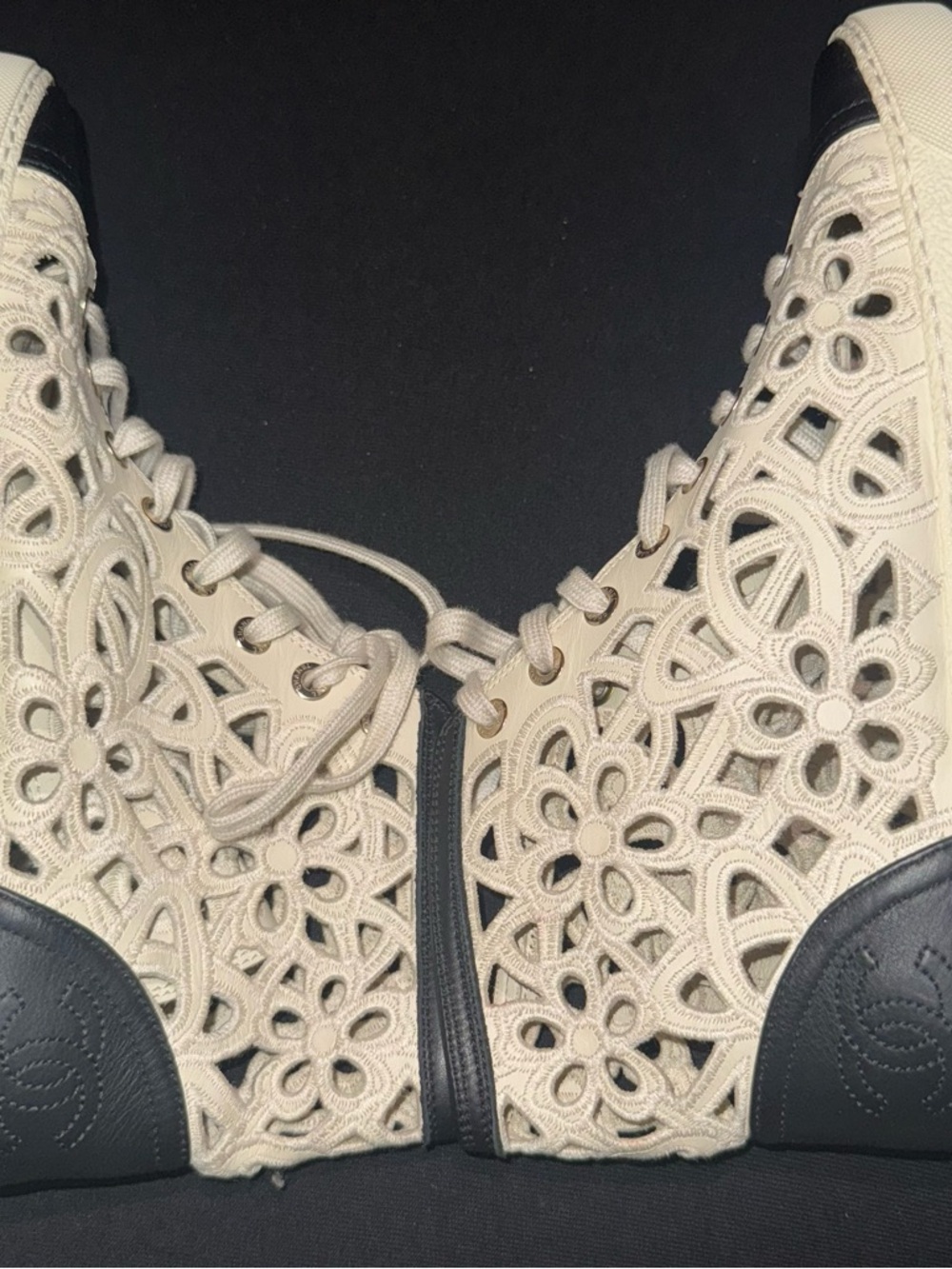 CHANEL Cream Cutout High-Top Sneakers with Black Toe Caps - Picture 3 of 4